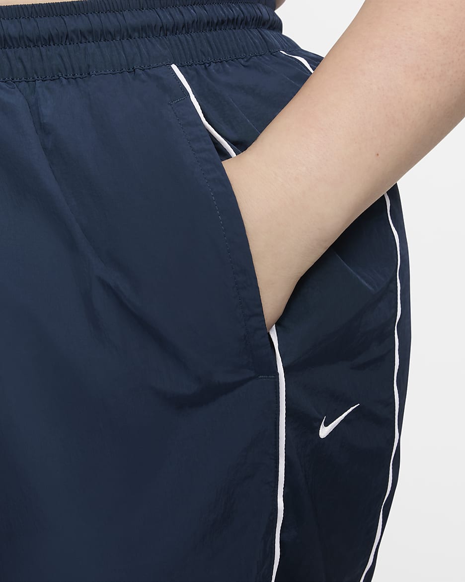 Pants con dobladillo abierto de tejido Woven de tiro alto para mujer Nike Windrunner talla grande Nike